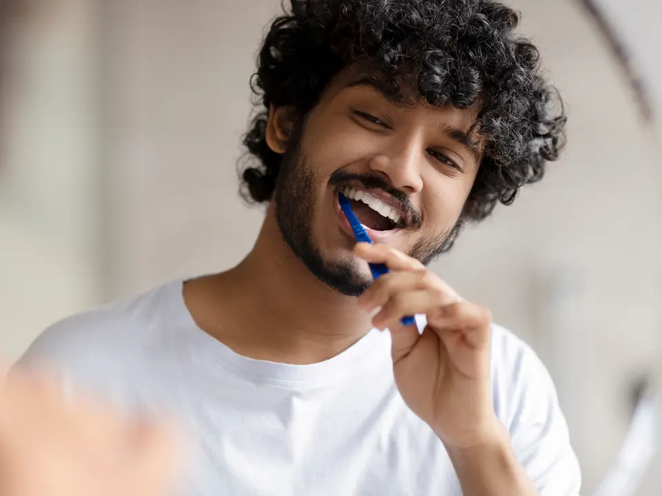 Man Brushing Teeth